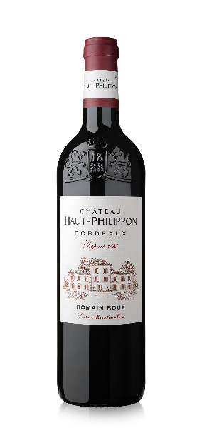 A bottle of Chateau Haut Philippon Bordeaux wine with a label showing the brand name and the wine color as red.